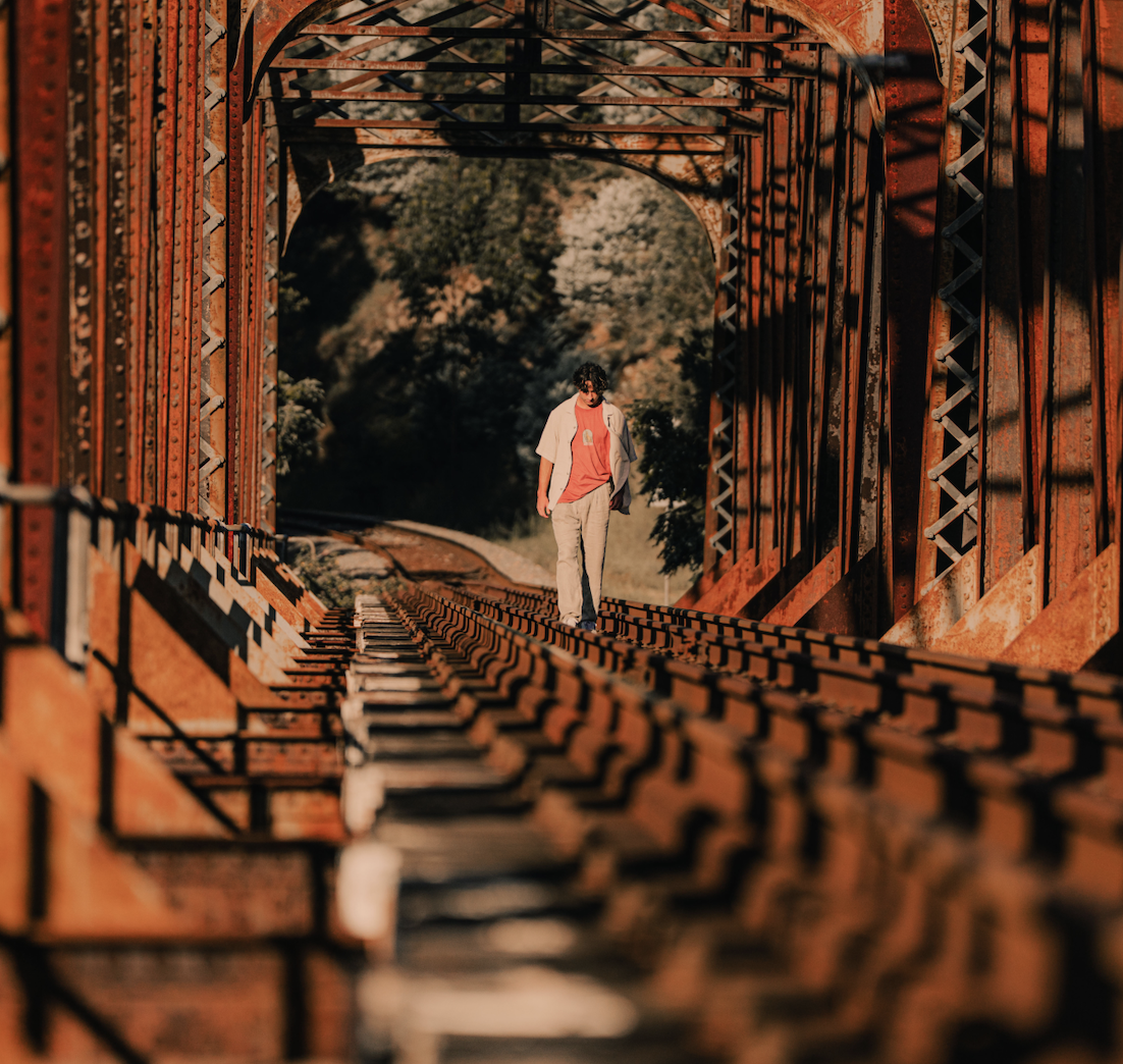 Dom Moore glides in with shimmering debut single “Parachute”