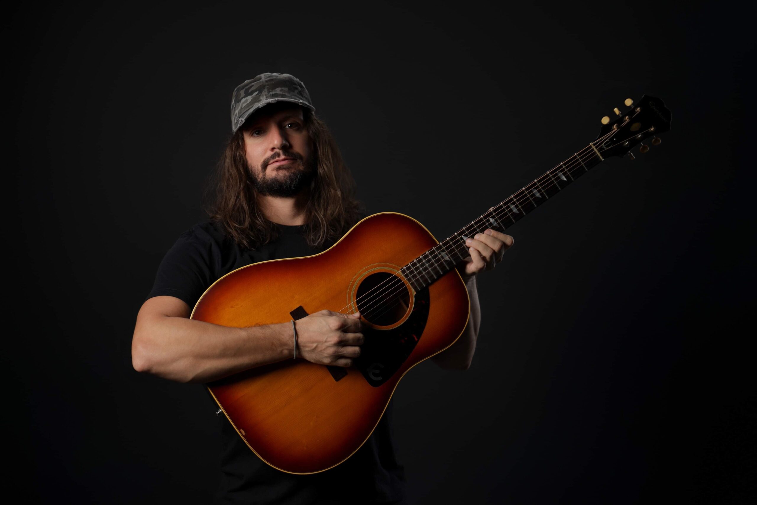 Jutt Huffman explores faith and temptation on “Whiskey Hell Bent Angels”